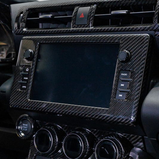 JDMuscle 22-25 BRZ/GR86 Tanso Dry Carbon Fiber Center Mutimedia/ Radio Screen Cover w/ Gloss Finish